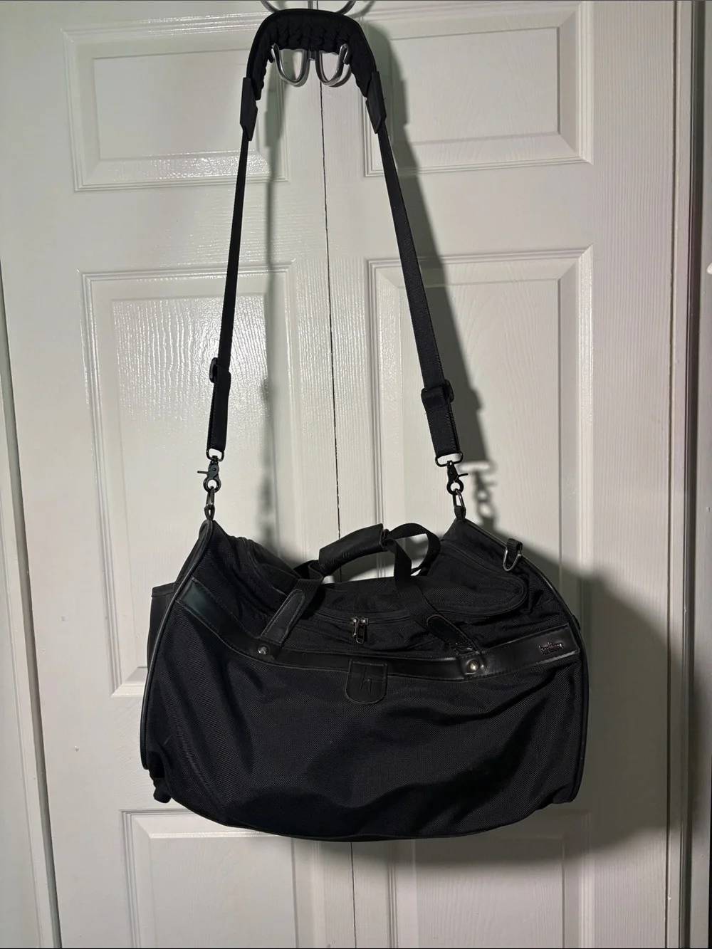 Hartmann zip around nylon and leather duffle style bag.